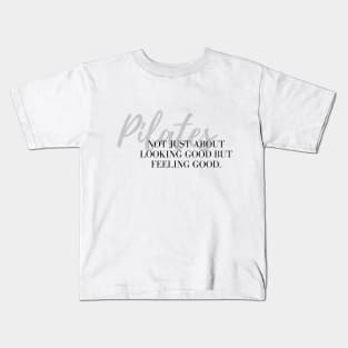 Pilates not just about looking good but feeling good. Kids T-Shirt